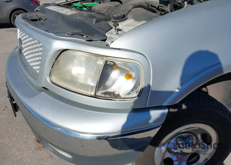 1999 Ford F-150 Lariat/Xl/Xlt из США, поврежденный, VIN 1FTRX18L9XNB80468